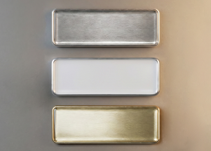 Silver, white and gold name tags